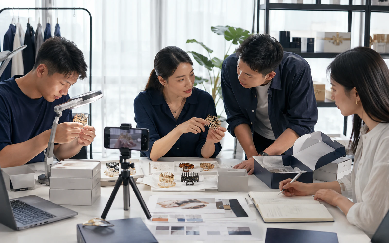 TikTok Shop team checking a fast-moving product sample, compact packaging, filming setup, and repeatable packout details